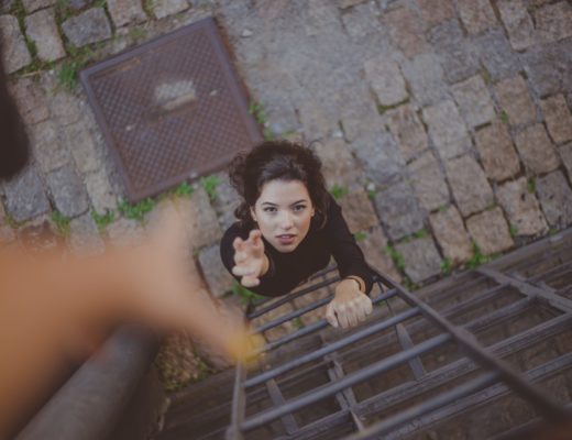 high-angle-photo-of-woman-on-ladder