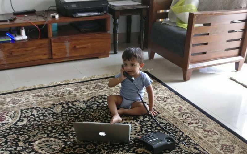 baby in phone and laptop