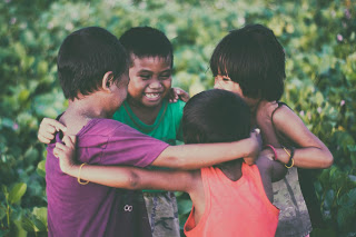 children group hug friends